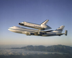 Space Shuttle Piggy Back on a 747 Jet.